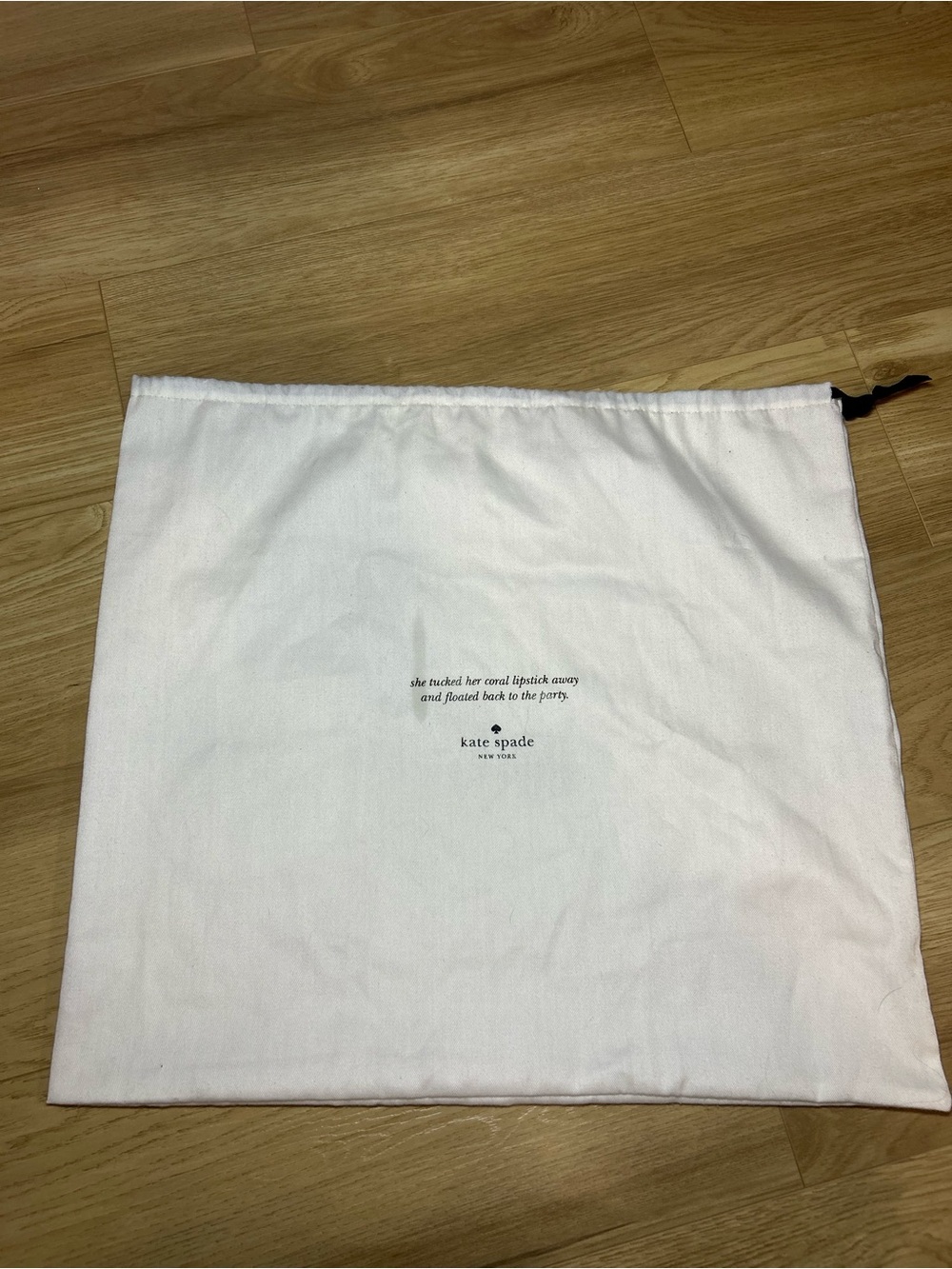 kate spade White Drawstring Dust Bag with Printed Quote and Logo